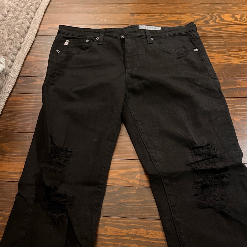AG cigarette black skinny jean, distressed with raw hem, size 29